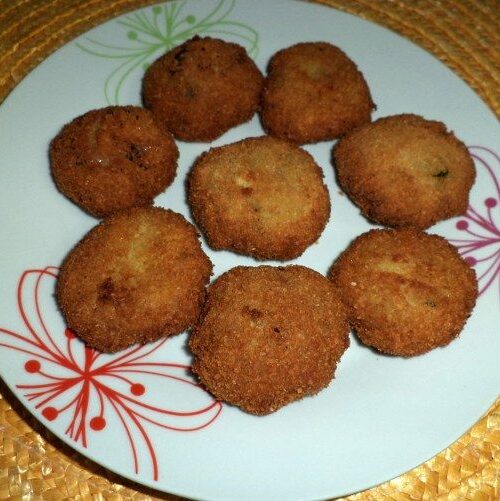 Polpette a base di polpa di melanzana lessata, panate e fritte
