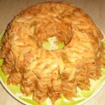 Sformato di pasta con ragù di salsiccia e piselli