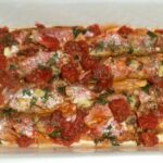 Triglie con pomodoro e origano cotte al forno